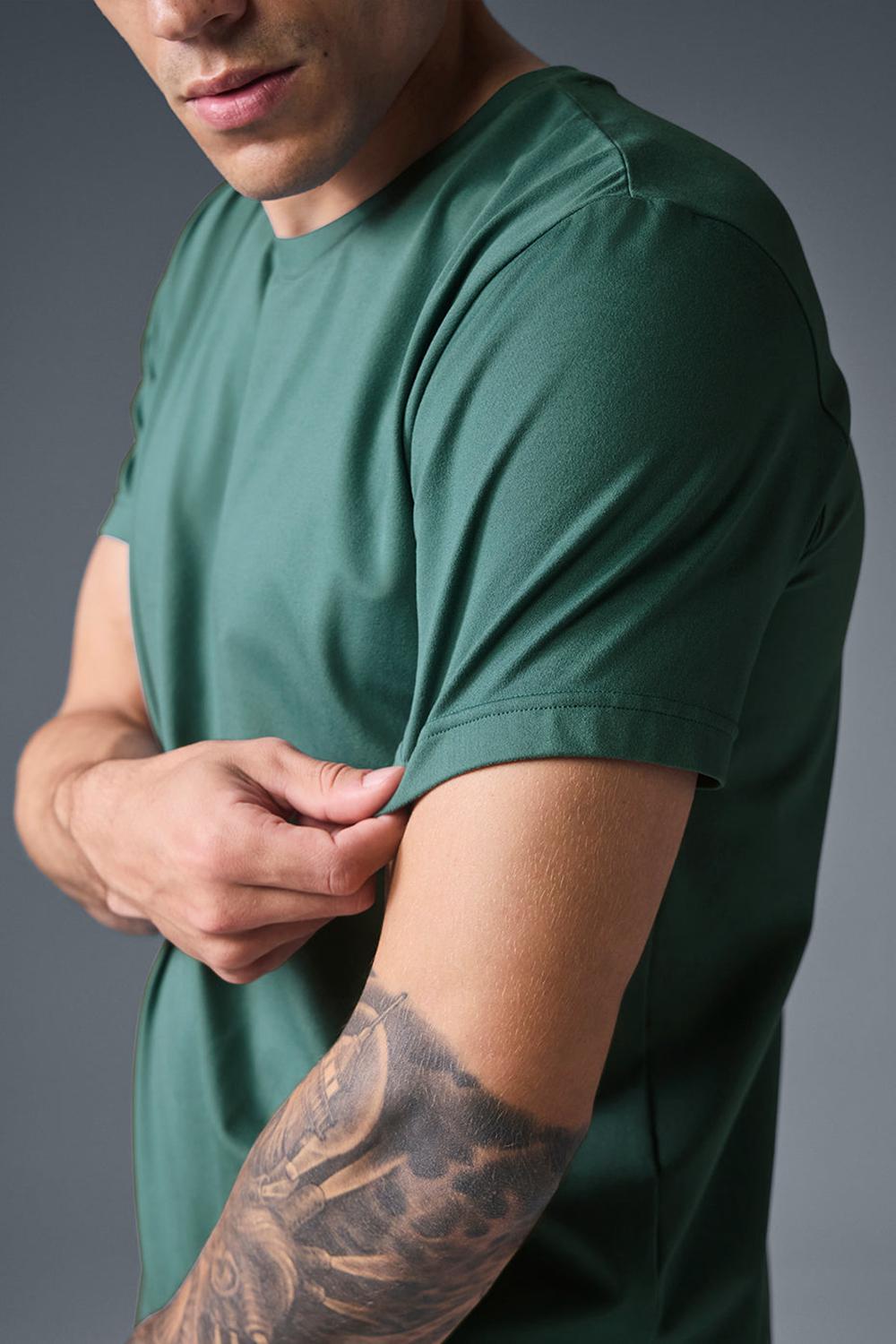 Alo Yoga Conquer Reform Crewneck Uomo Short Sleeve Winter Ivy | Italia  YNE-938254
